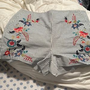 New with tags, nautical navy and cream shorts with colorful embroidery.
